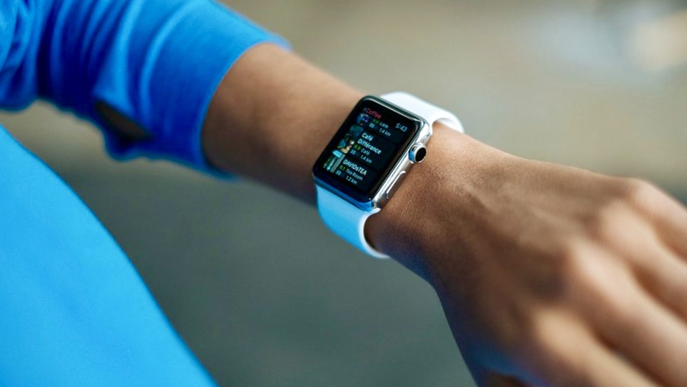Smartwatch displaying AI-powered features on a user’s wrist, representing the rise of intelligent wearable technology