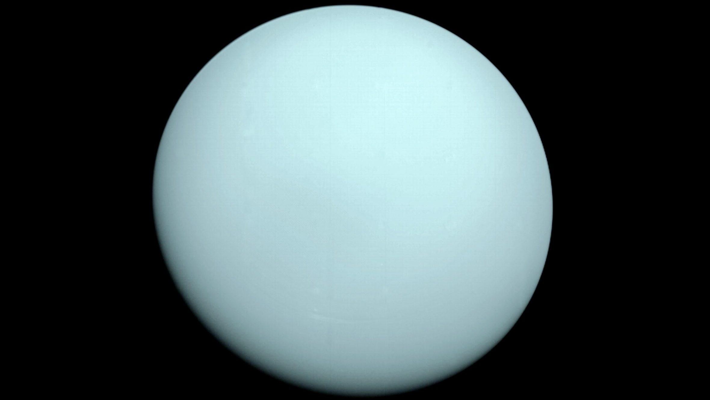 Uranus photographed by NASA’s Voyager 2 spacecraft during its flyby of the planet in 1986. The mission provided the first close-up images and scientific data about the distant ice giant.