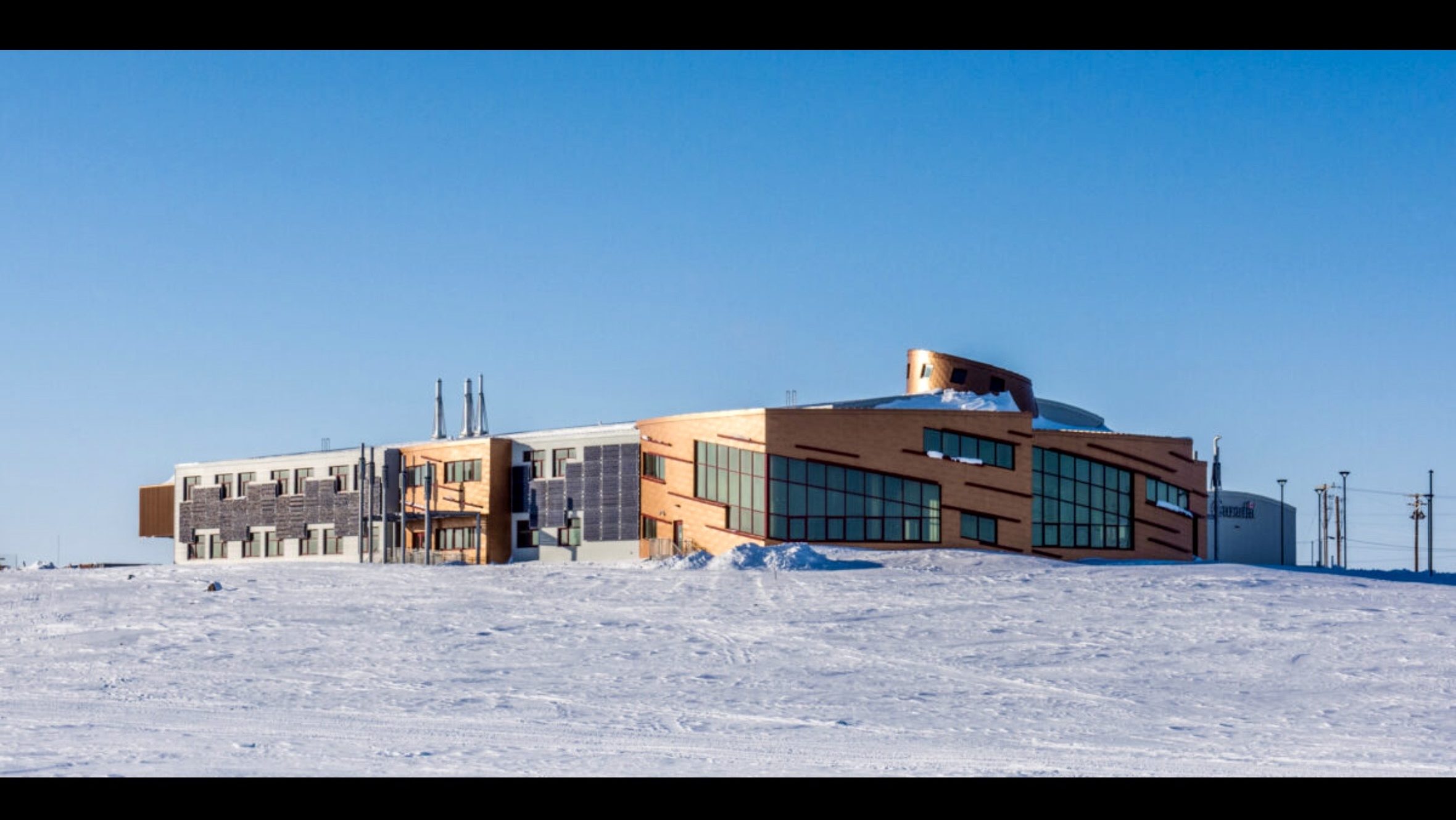 Research facility in the Arctic region surrounded by snow, representing growing geopolitical and strategic interest in the Arctic