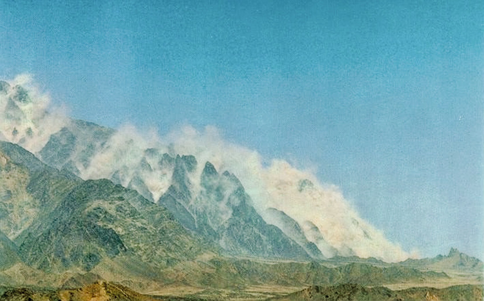 Smoke rises over the Chagai Hills in Pakistan after underground nuclear weapons tests conducted in May 1998.