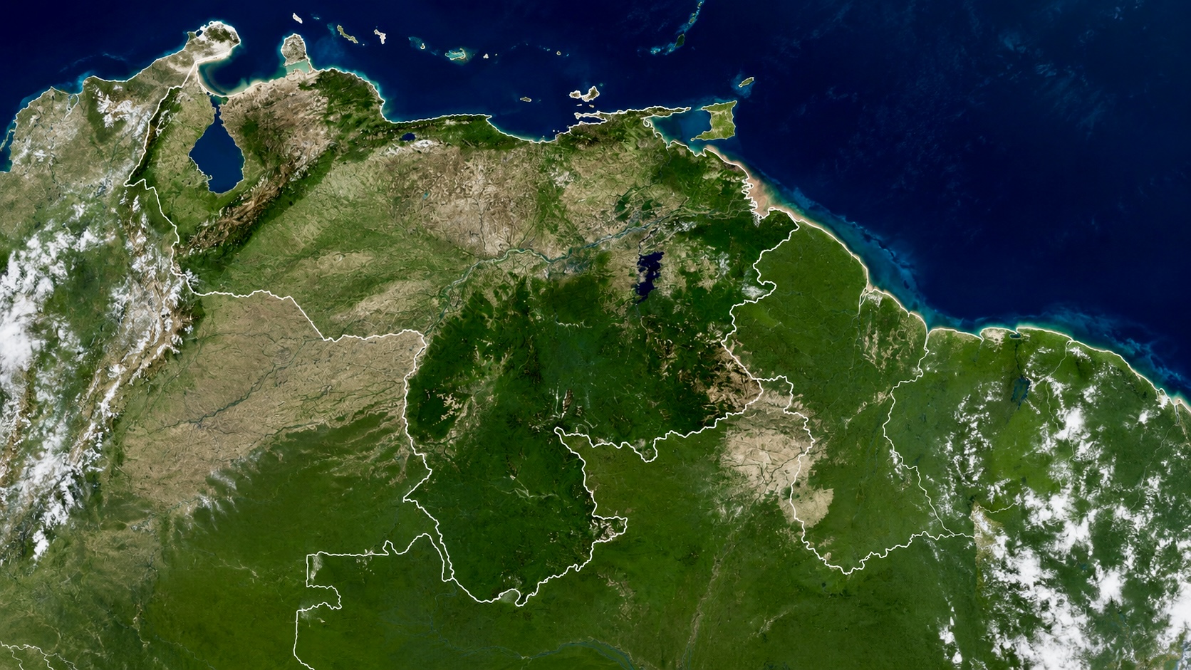 Satellite image of Venezuela showing the country’s geography, Caribbean coastline, Lake Maracaibo, and surrounding regions.